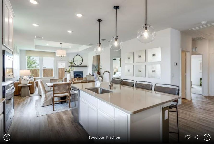 Interior photos- Photo of Pulte model home with same floor plan, not of actual home listed.