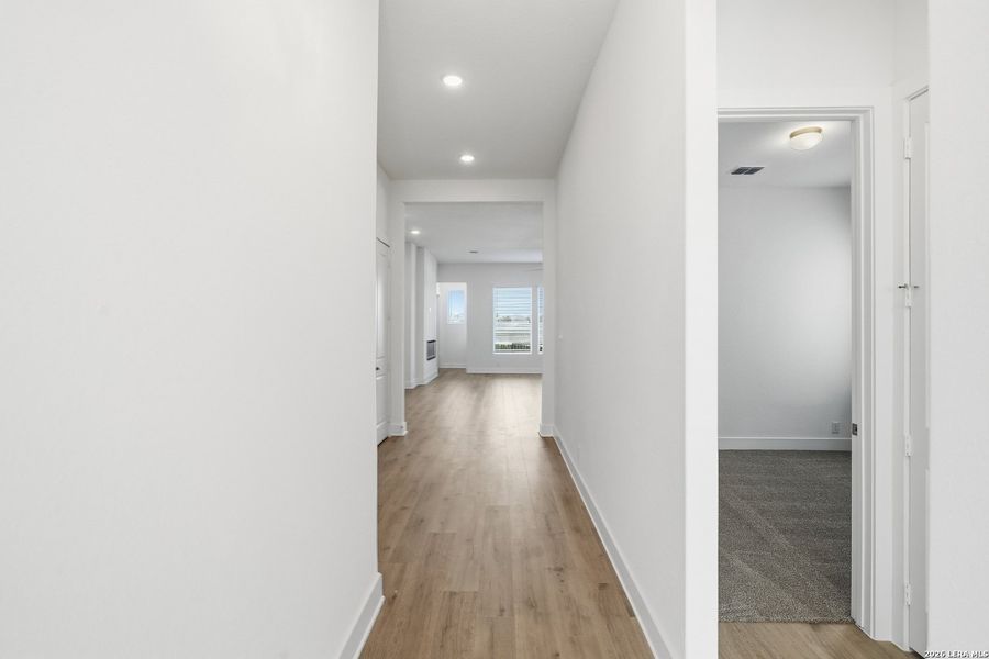Spacious, unfurnished interior of a new home in Prominence, San Antonio (Image 14).