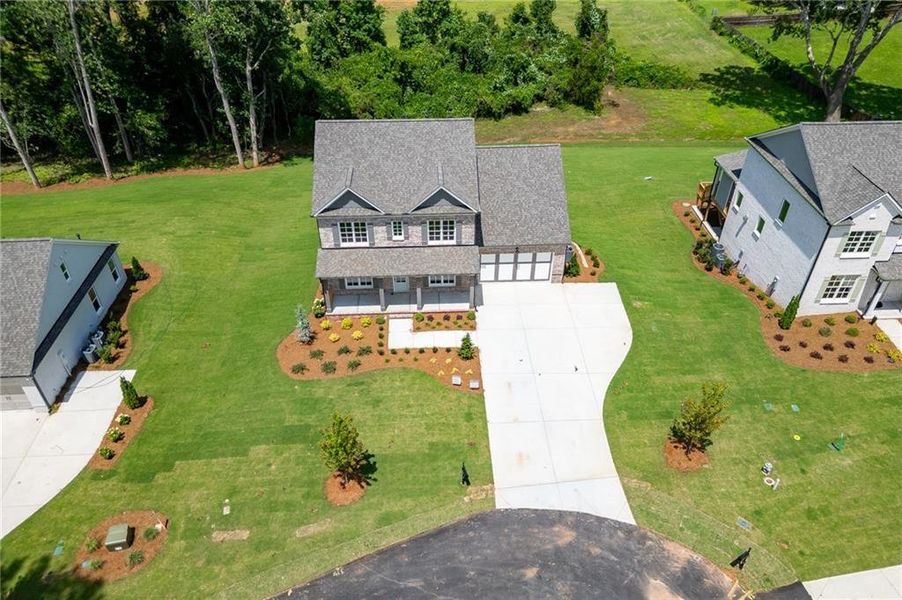 Front exterior of a new home in , Buford, GA, highlighting curb appeal (Image 26).