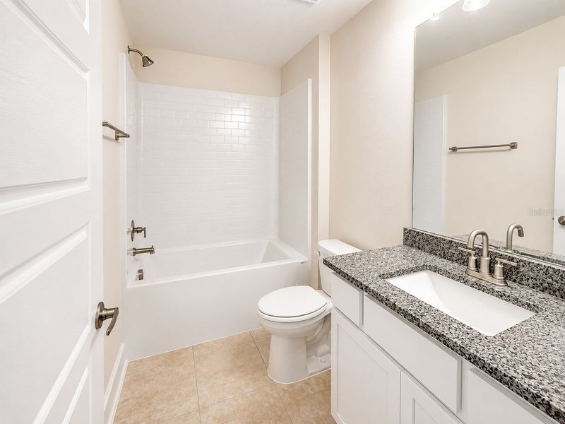 Furnished interior view inside a new home in Harmony Central, St. Cloud (Image 8).