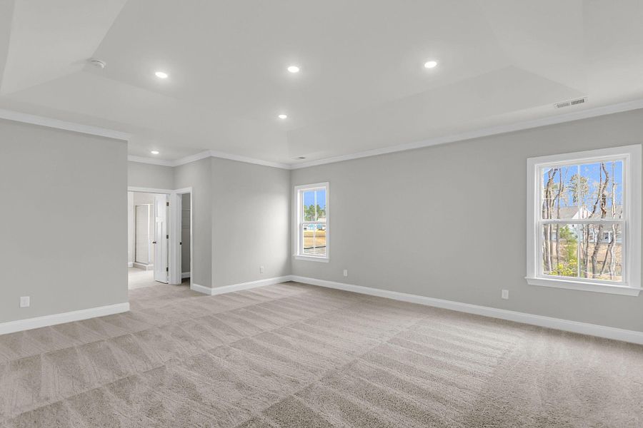 Spacious, unfurnished interior of a new home in Tidewater at Lakes of Cane Bay, Summerville (Image 49).