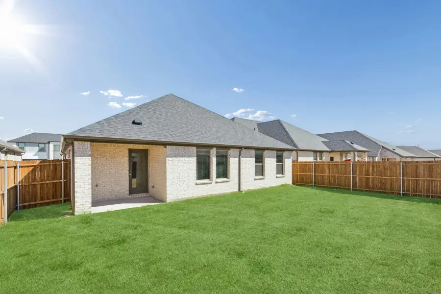 Covered Patio in the Harrison home plan by Trophy Signature Homes – REPRESENTATIVE PHOTO Covered Patio in the Harrison home plan by Trophy Signature Homes – REPRESENTATIVE PHOTO