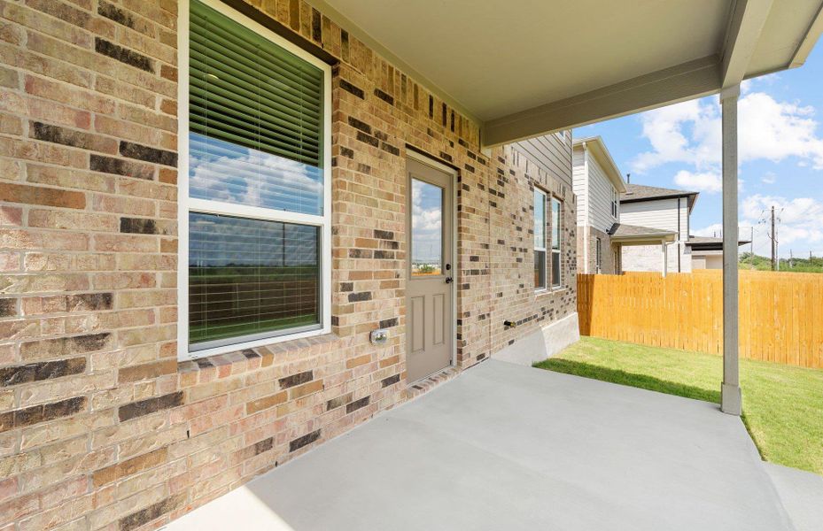 Exterior details and patio area of a home in Crosswinds, Kyle (Image 2). Exterior details and patio area of a home in Crosswinds, Kyle (Image 2).