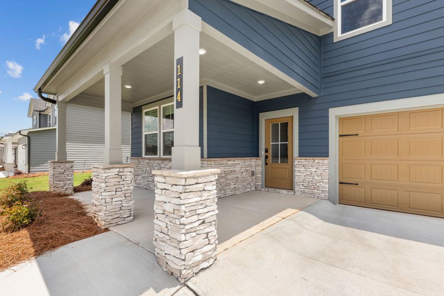 A house with a stone driveway. A house with a stone driveway.