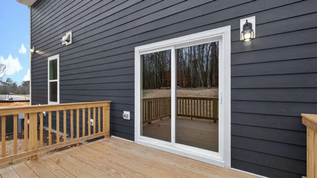 Exterior details and patio area of a home in The Estates Park, Apex (Image 3).