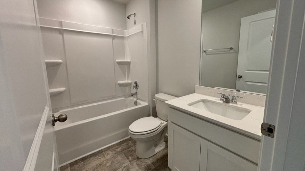 Furnished interior view inside a new home in The Parks, White House (Image 25).