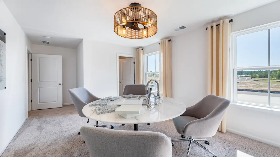 Representative furnished interior of a home built from the Avondale by DRB Homes in Cottages of Bearwood, Mount Pleasant (Image 13).