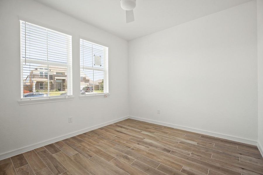 Spacious, unfurnished interior of a new home in Westland Ranch - 70' Homesites, League City (Image 25).