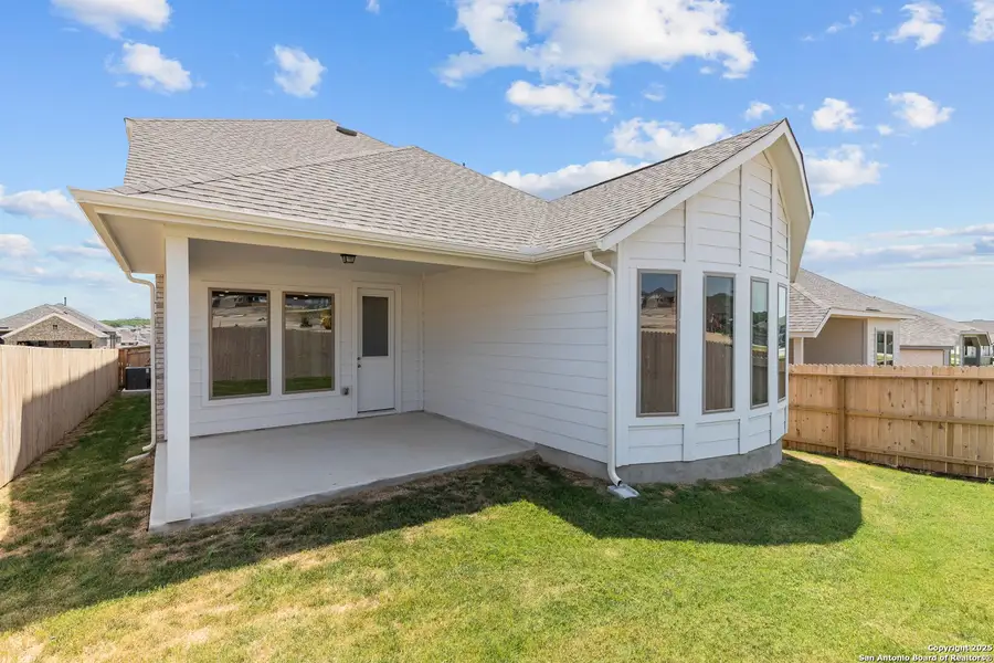 Front exterior of a new home in Ladera, San Antonio, TX, highlighting curb appeal (Image 19). Front exterior of a new home in Ladera, San Antonio, TX, highlighting curb appeal (Image 19).