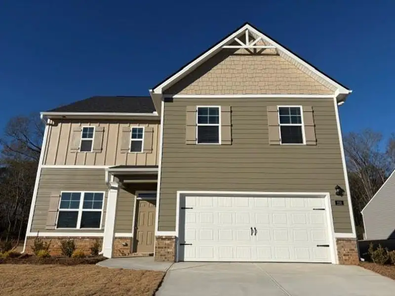 Front exterior of a new home in Jackson Landing, Jefferson, GA, highlighting curb appeal (Image 2).