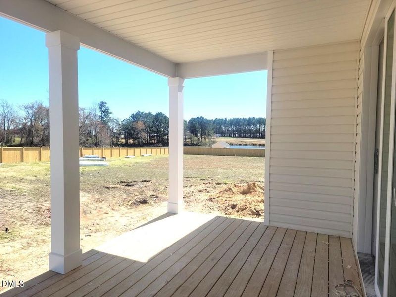 Exterior details and patio area of a home in Tobacco Road, Angier (Image 2).