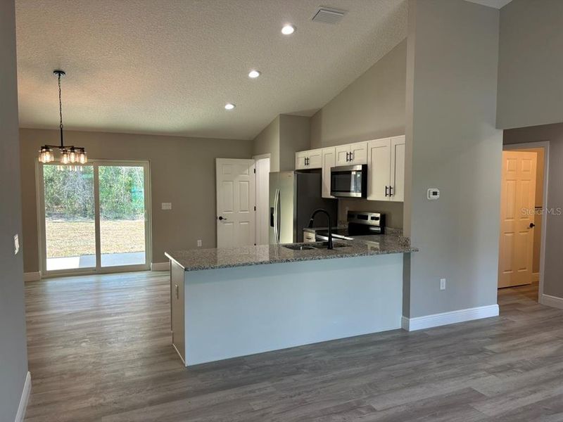 Furnished interior view inside a new home in , Dunnellon (Image 6).