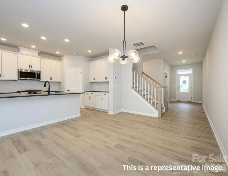 Spacious, unfurnished interior of a new home in North Creek Village, Huntersville (Image 7).