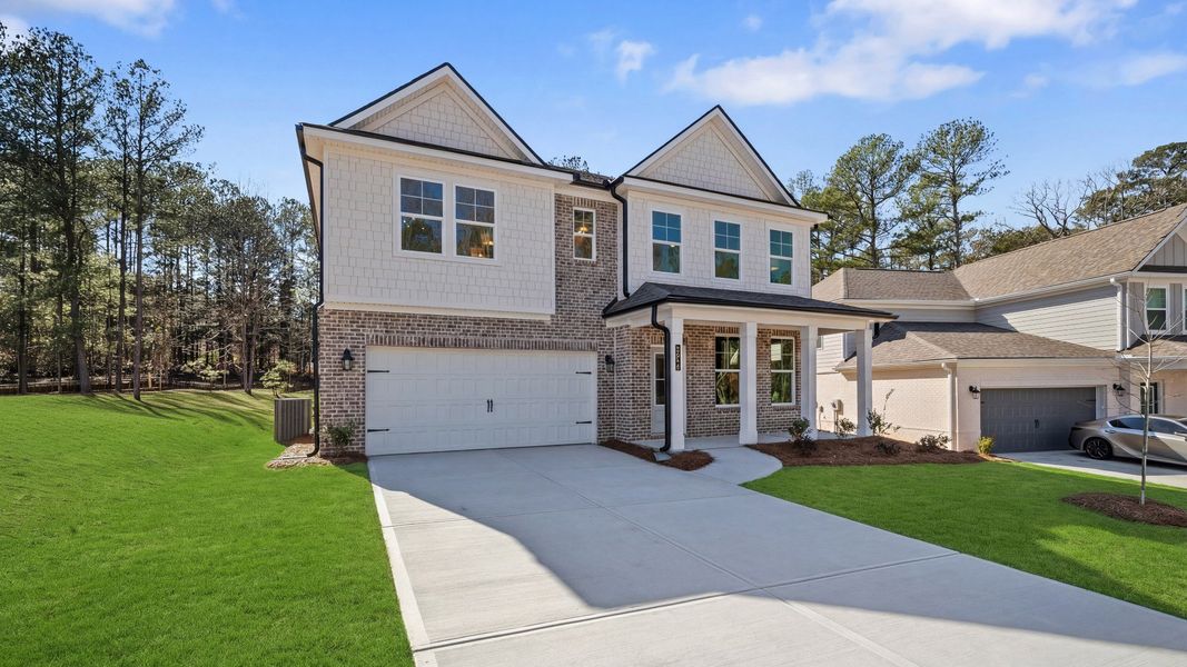 Front exterior of Brier Creek floorplan with 2-car garage Front exterior of Brier Creek floorplan with 2-car garage
