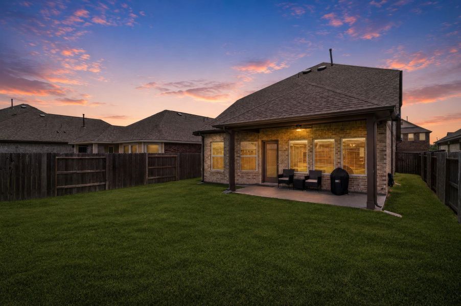 Exterior details and patio area of a home in Marvida, Cypress (Image 24).
