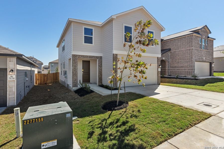 Front exterior of a new home in Knox Ridge, Converse, TX, highlighting curb appeal (Image 1). Front exterior of a new home in Knox Ridge, Converse, TX, highlighting curb appeal (Image 1).