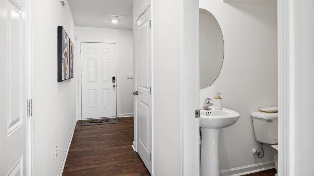 Representative furnished interior of a home built from the Altamont Townhome by D.R. Horton in Belcourt Landing, Cleveland (Image 10).