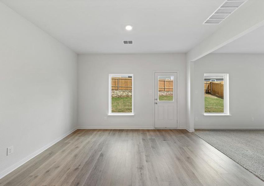 The dining room has a large window.