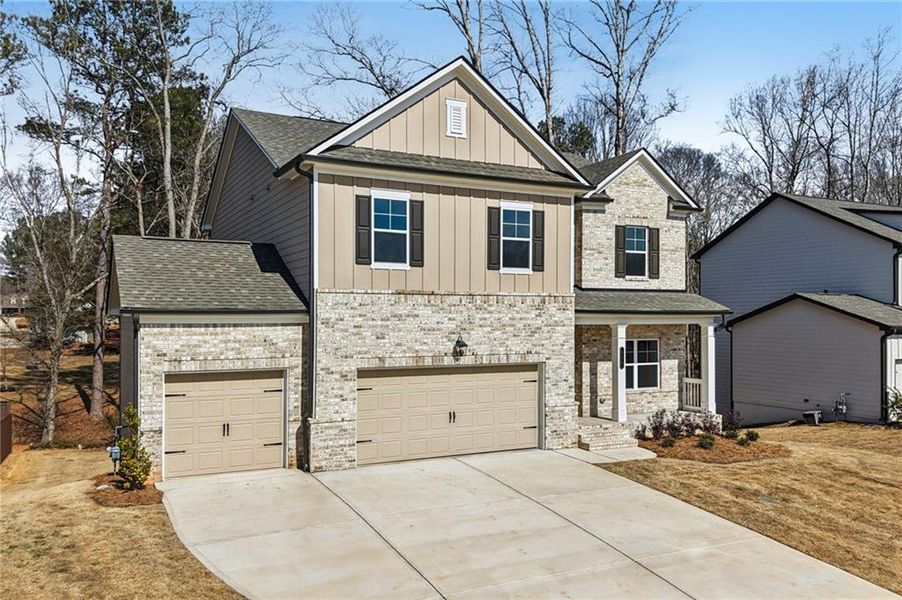 Front exterior of a new home in Rosewood Lake Estates, Hoschton, GA, highlighting curb appeal (Image 29).