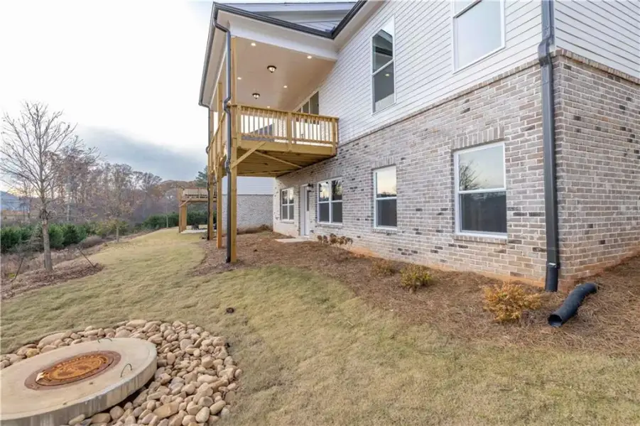 Exterior details and patio area of a home in Aberdeen, Hoschton (Image 43).