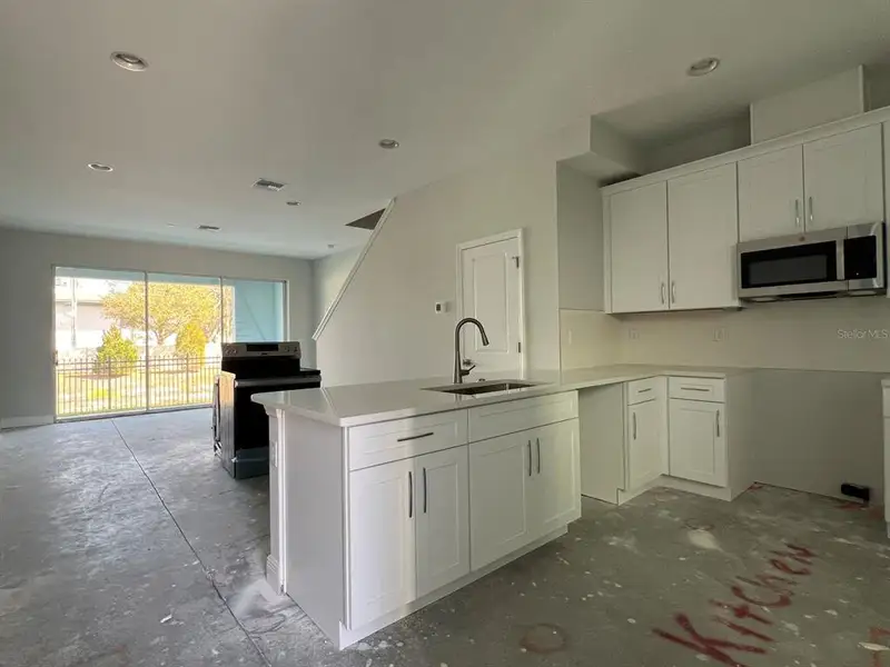 In-progress construction of a new home in , Seminole, FL (Image 4).