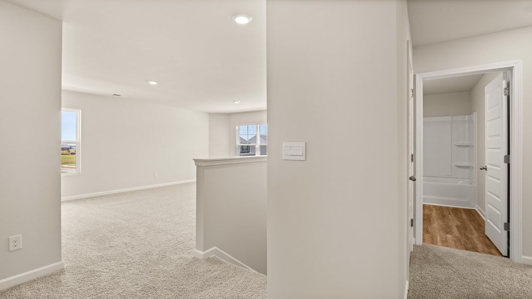 Representative unfurnished interior of a home built from the Elle by D.R. Horton in Preserve at Dove Creek, Statham (Image 20).