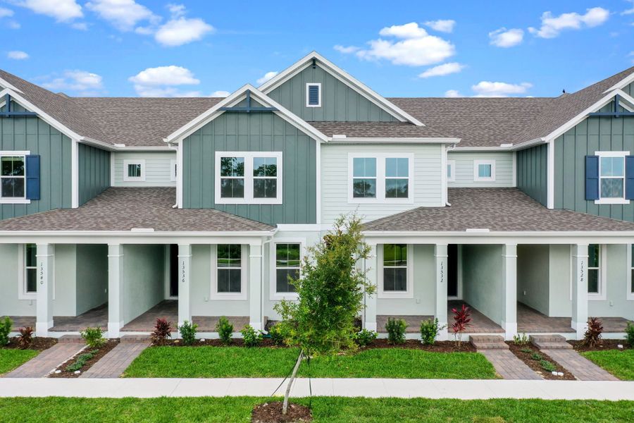 Representative exterior photo of a completed home built from the Newton by Rockwell Homes in Harvest at Ovation - Townhomes, Winter Garden, FL (Image 33). Representative exterior photo of a completed home built from the Newton by Rockwell Homes in Harvest at Ovation - Townhomes, Winter Garden, FL (Image 33).