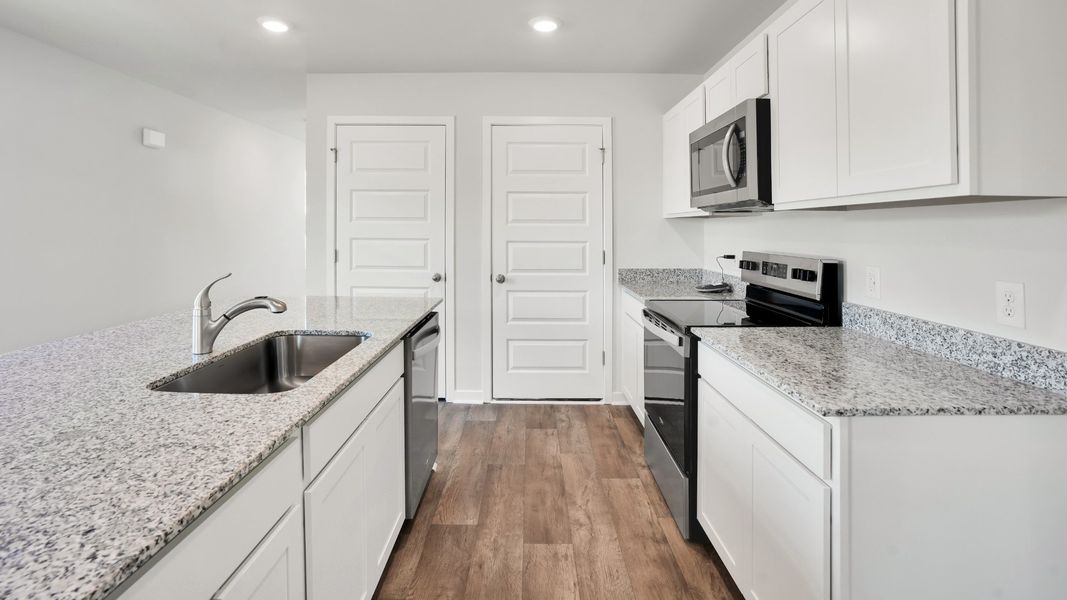 Furnished interior view inside a new home in Lockwood Landing, Supply (Image 8). Furnished interior view inside a new home in Lockwood Landing, Supply (Image 8).