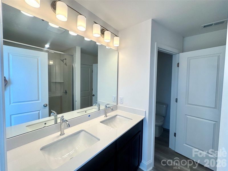 Double vanity sink w/ private water closet