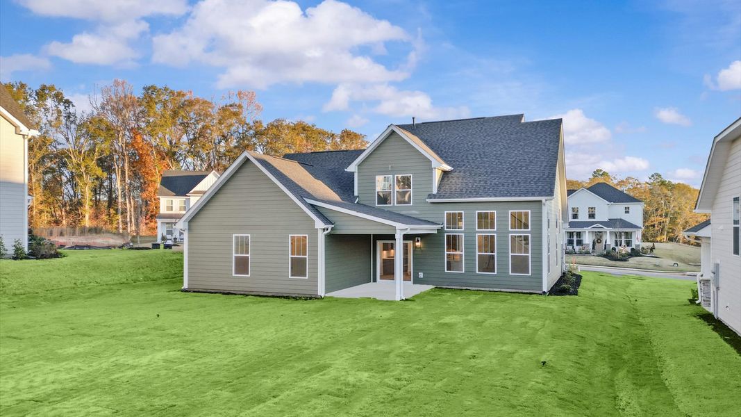 Accomplished exterior with a spacious rear porch that blends comfort and style