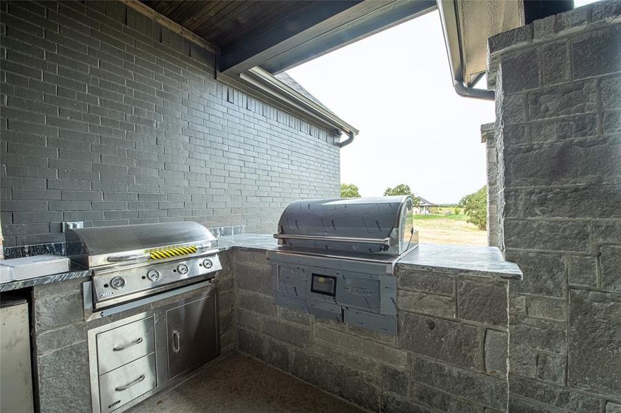 View of patio with exterior kitchen View of patio with exterior kitchen