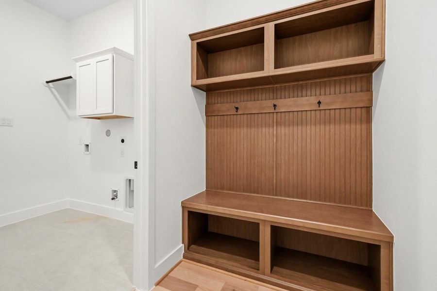 Furnished interior view inside a new home in Dunham Pointe 70', Cypress (Image 8).
