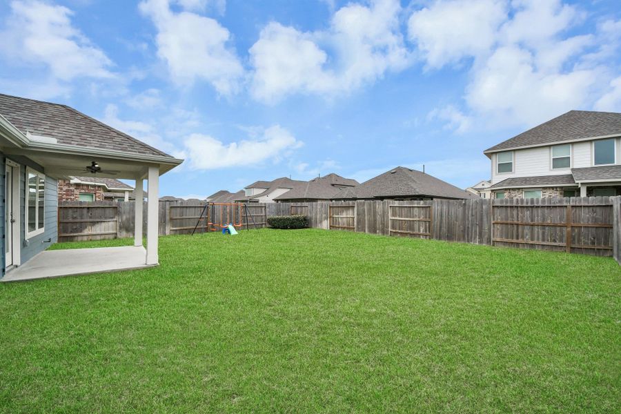 Exterior details and patio area of a home in Marvida, Cypress (Image 25).