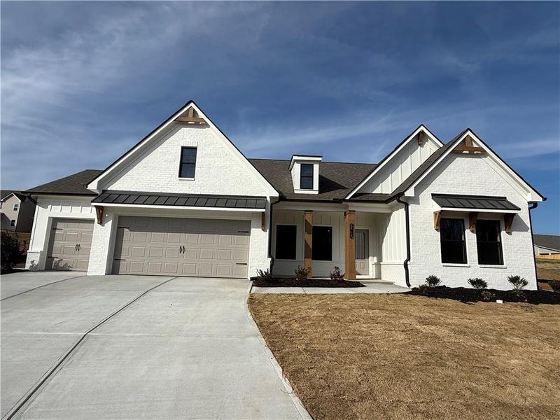 Front exterior of a new home in Ponderosa Farms Reserve, Gainesville, GA, highlighting curb appeal (Image 26).