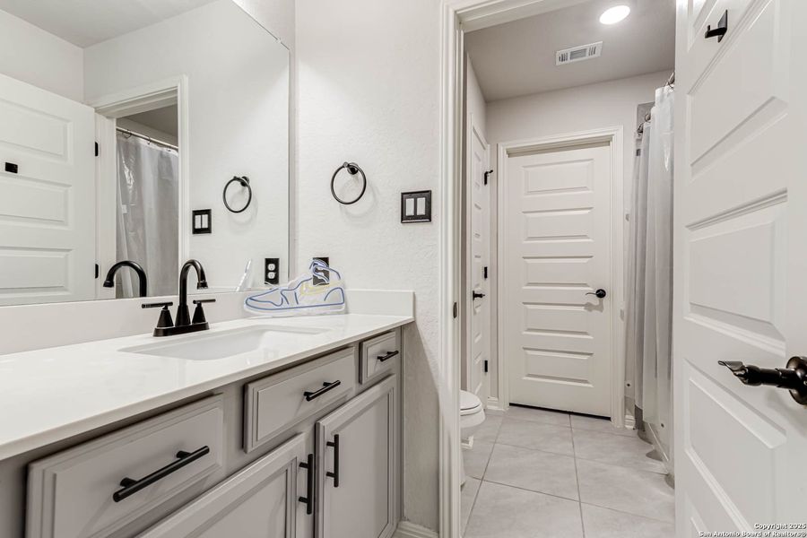 Furnished interior view inside a new home in Prescott Oaks, San Antonio (Image 10).
