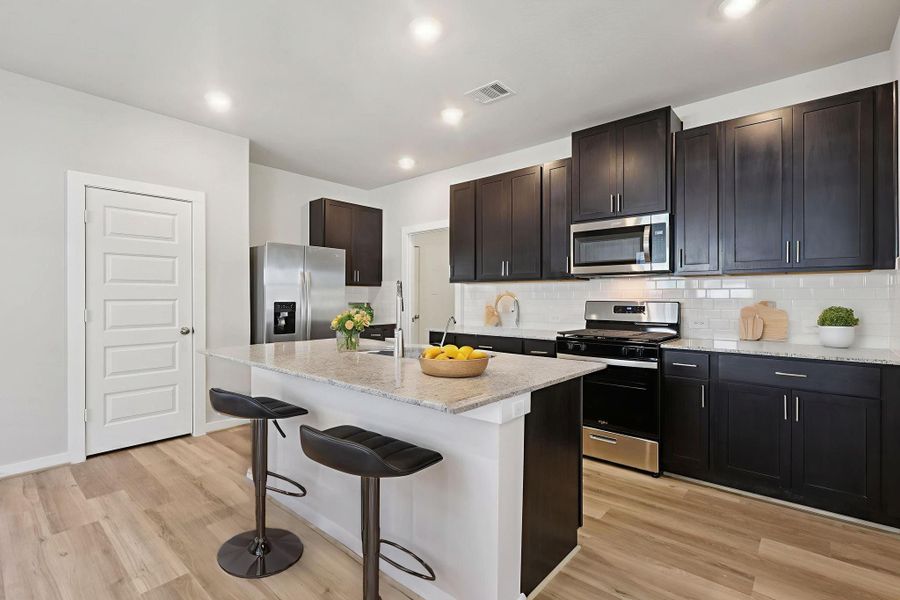 Photo is not of the actual home, but is an inspirational photo of builder’s model home and may depict options, furnishings, and/or decorator features that are not included