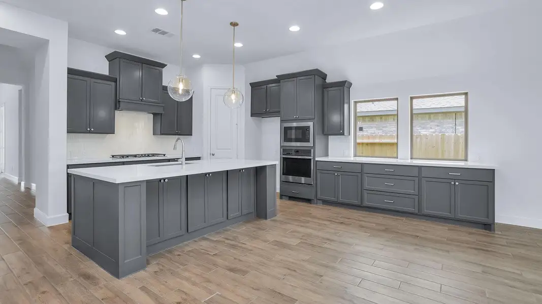 Furnished interior view inside a new home in Grand Central Park 50', Conroe (Image 9). Furnished interior view inside a new home in Grand Central Park 50', Conroe (Image 9).