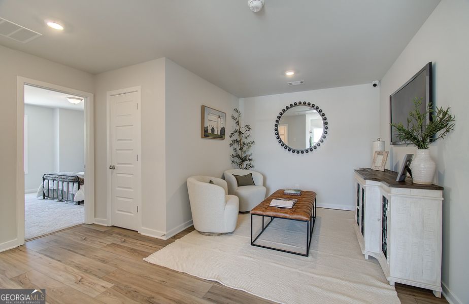 Furnished interior view inside a new home in The Towns at Auburn Station West, Auburn (Image 15).