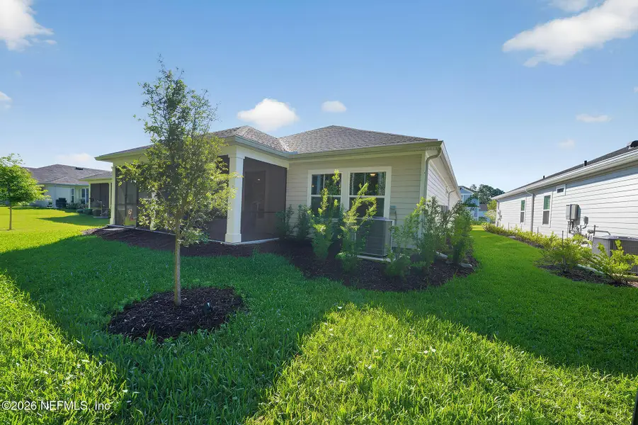 Exterior details and patio area of a home in , Yulee (Image 3).