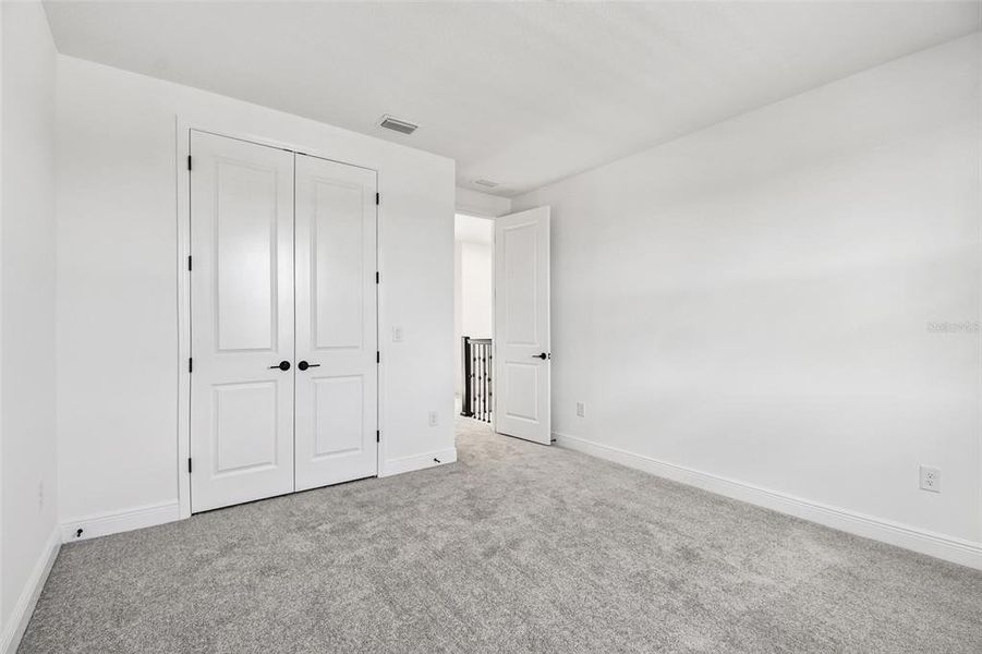 Spacious, unfurnished interior of a new home in Creeks Edge at Twin Rivers, Parrish (Image 54).