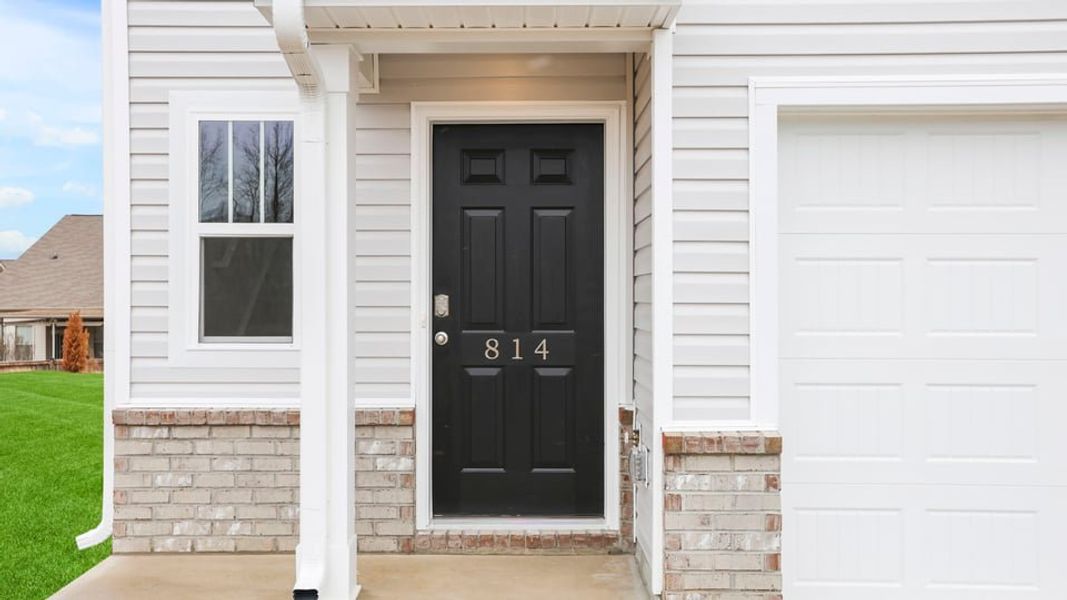 Exterior details and patio area of a home in Covington Village, Greer (Image 4).