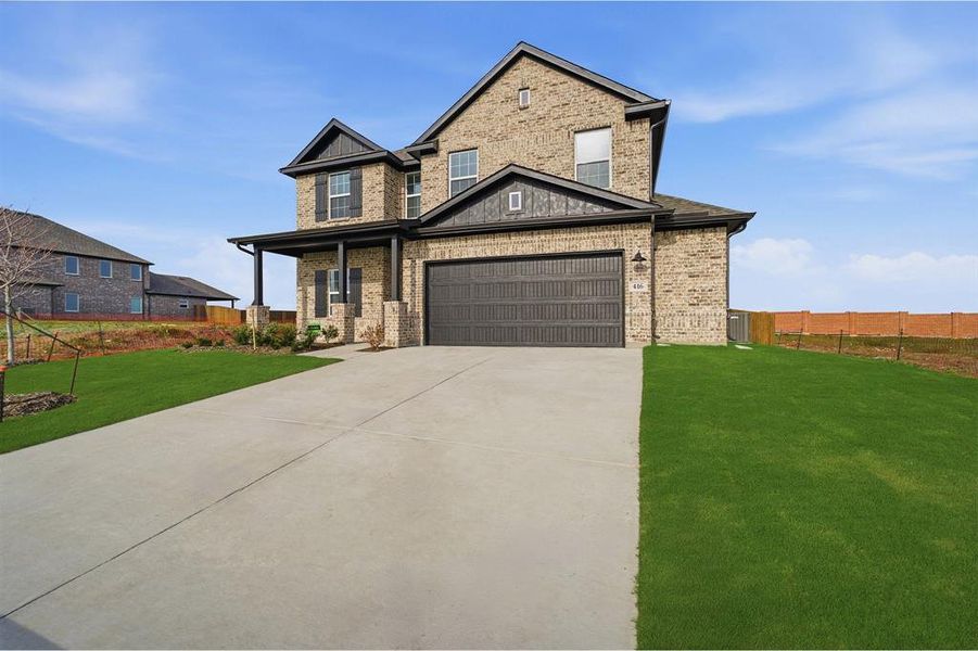 Front exterior of a new home in Saddlebrook Estates, Waxahachie, TX, highlighting curb appeal (Image 21).