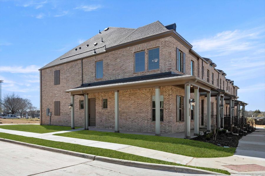 Representative exterior photo of a completed home built from the Darmouth by Ashton Woods in Parkside, Mansfield, TX (Image 1).