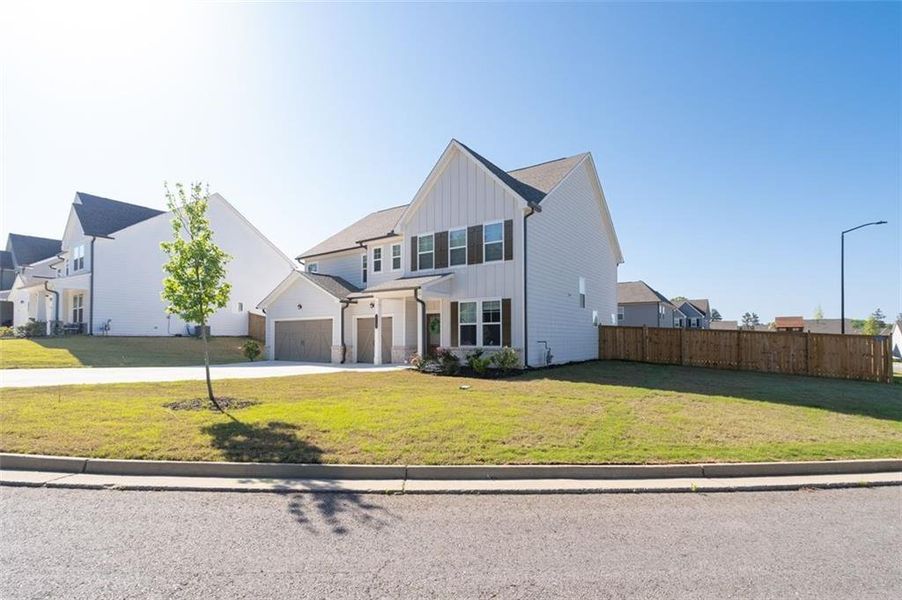 Front exterior of a new home in , Dallas, GA, highlighting curb appeal (Image 29).