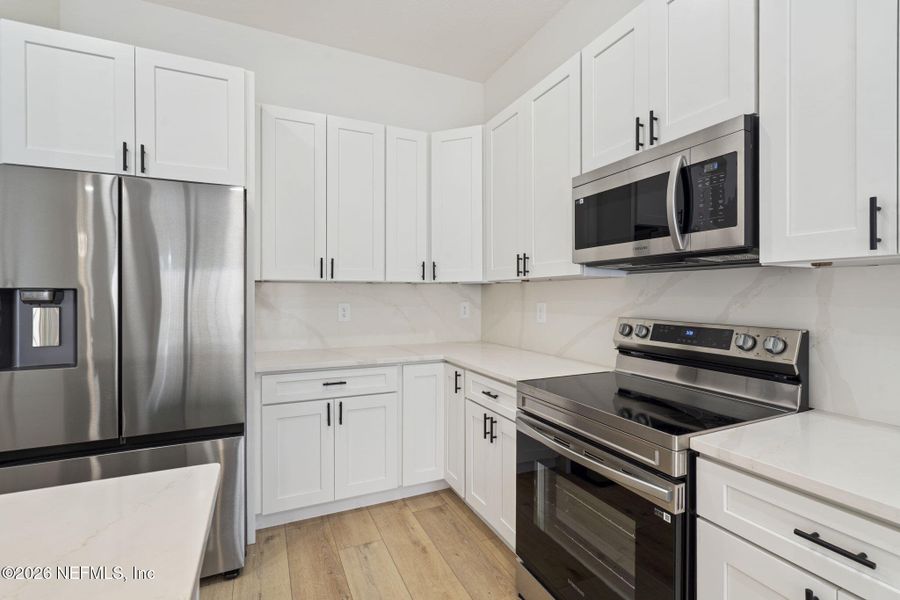 Furnished interior view inside a new home in , Orange Park (Image 33).