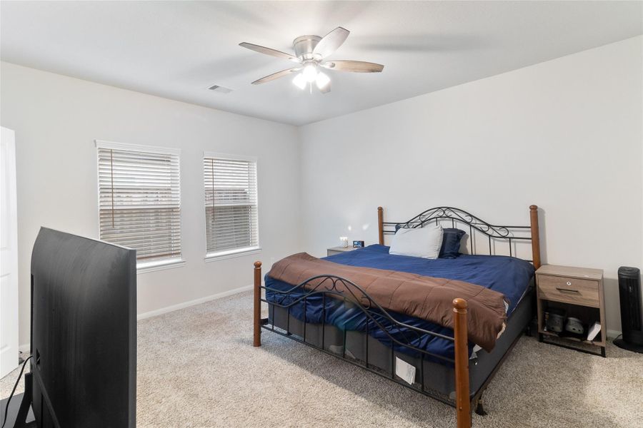 Experience the luxury of a spacious main bedroom, offering ample room for comfort and relaxation. Experience the luxury of a spacious main bedroom, offering ample room for comfort and relaxation.