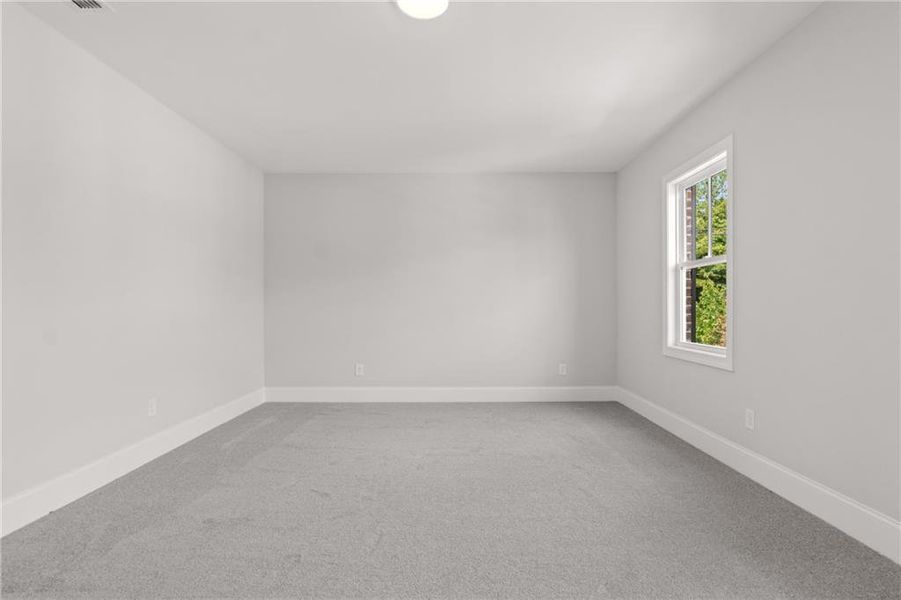 Spacious, unfurnished interior of a new home in Bellwyn, Johns Creek (Image 18).