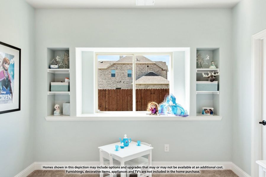 Child's bedroom with built-in shelves flanking a large window and small play table on carpet Child's bedroom with built-in shelves flanking a large window and small play table on carpet
