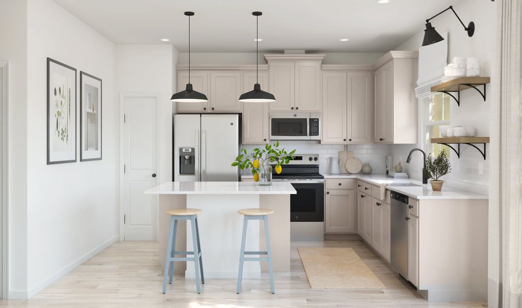 Kitchen with pendant lights over island