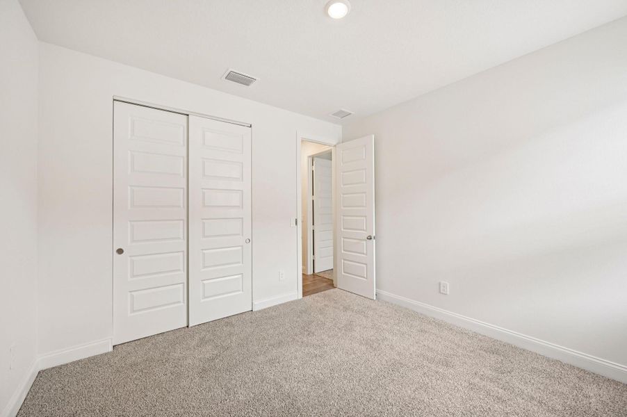 Spacious, unfurnished interior of a new home in Hampton Park - Signature Series, Vero Beach (Image 12).